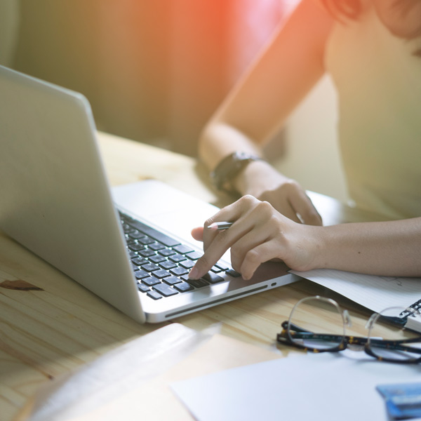 Woman viewing an eStatement on her laptop